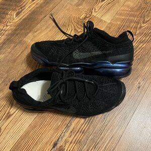Nike Black Knit Sneakers with Blue Accents